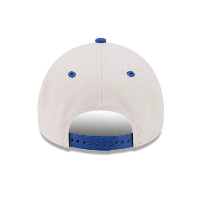 Pictured is this NBA Hardwood Classic Buffalo Braves 9FORTY A-Frame Adjustable cap in light beige & blue. 7
