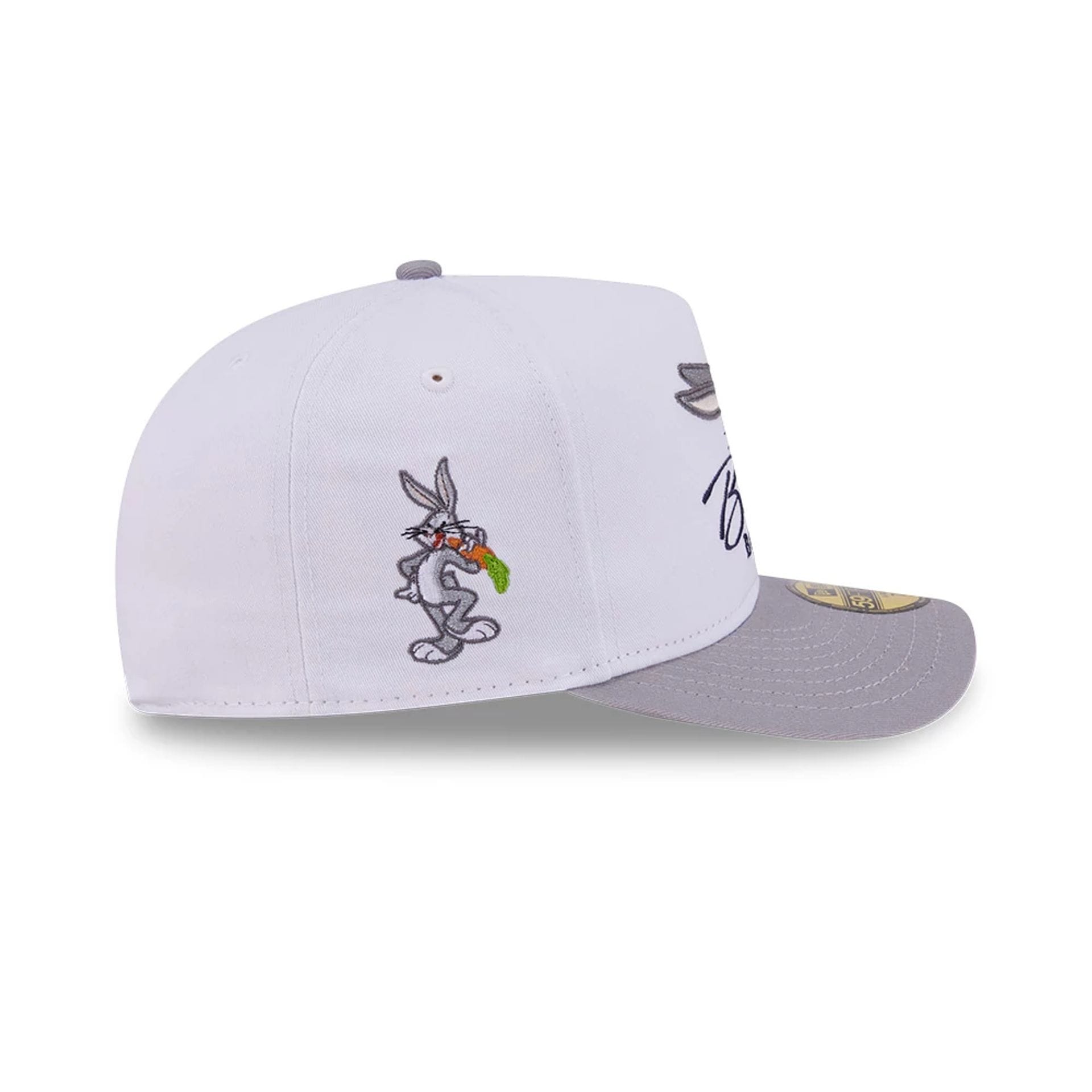Pictured is this Looney Tunes Bugs Bunny Script 59FIFTY A-Frame Fitted cap in white. 5