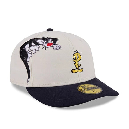 Pictured is this Looney Tunes Pwetty Cat Multi Character 59FIFTY Fitted cap in navy. 1
