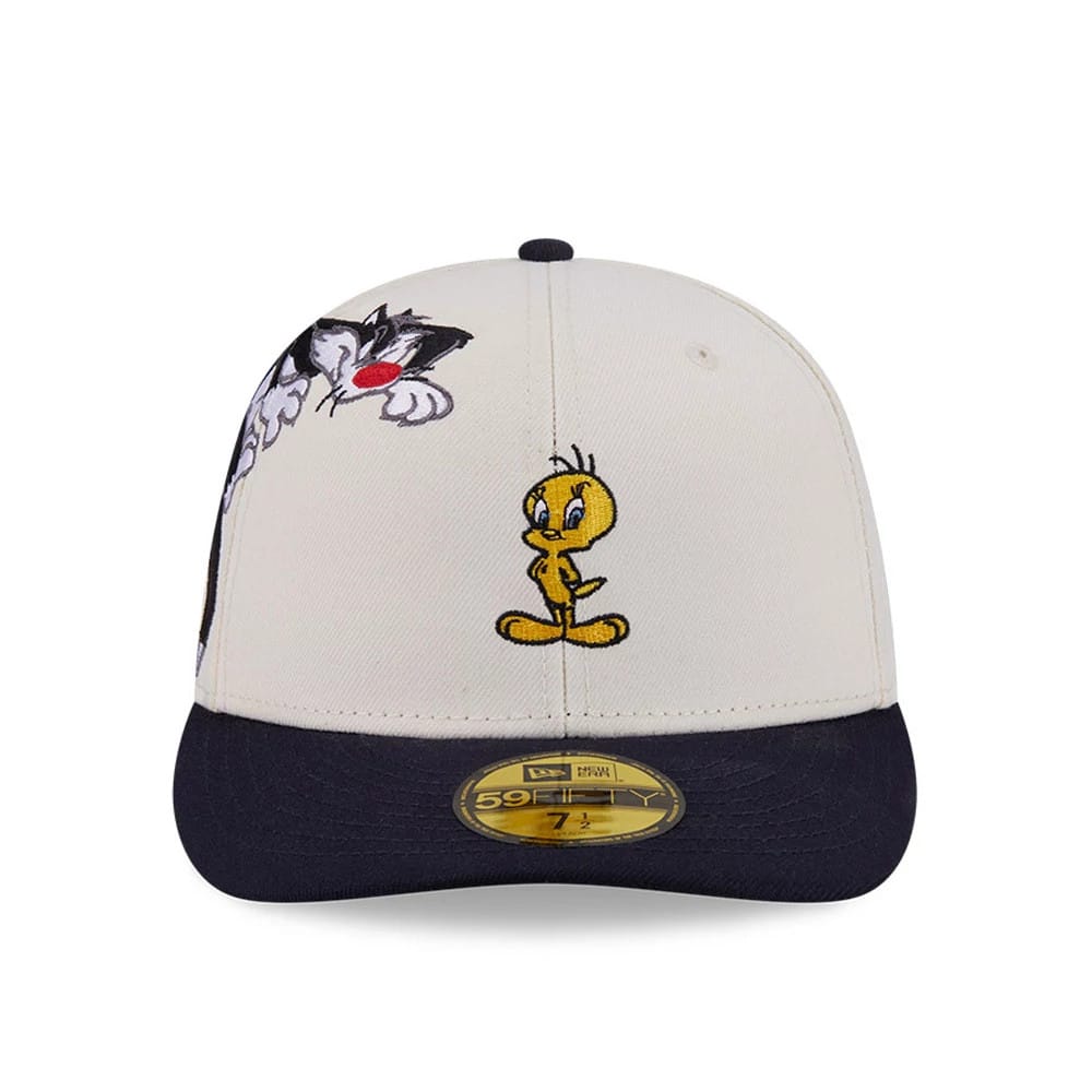 Pictured is this Looney Tunes Pwetty Cat Multi Character 59FIFTY Fitted cap in navy. 3