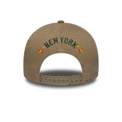 Pictured is this MLB Vibrant Festivities New York Yankees 9FORTY A-Frame Adjustable cap in Beige. 5