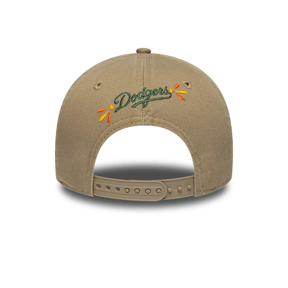 LA Dodgers MLB Vibrant Festivities Beige New Era 9FORTY A-Frame Adjustable Cap, rear view showing the green Dodgers logo with orange and yellow accents embroidered above the opening, with beige snapback strap and structured crown.