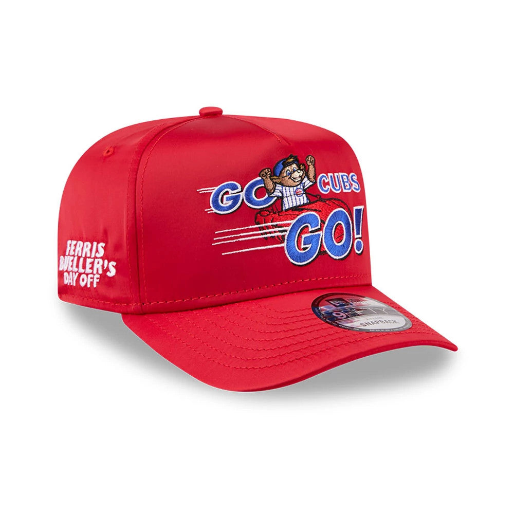 Cubs MLB X Ferris Bueller's Day Off Red New Era 9FIFTY A-Frame Snapback Adjustable Cap, front view showing the GO CUBS GO! slogan with a character driving a red car, side panel Ferris Bueller's Day Off text, and 9FIFTY size sticker on the visor.