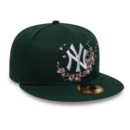 Pictured is this MLB Cherry Blossom New York Yankees 59FIFTY Fitted cap in dark green. 4