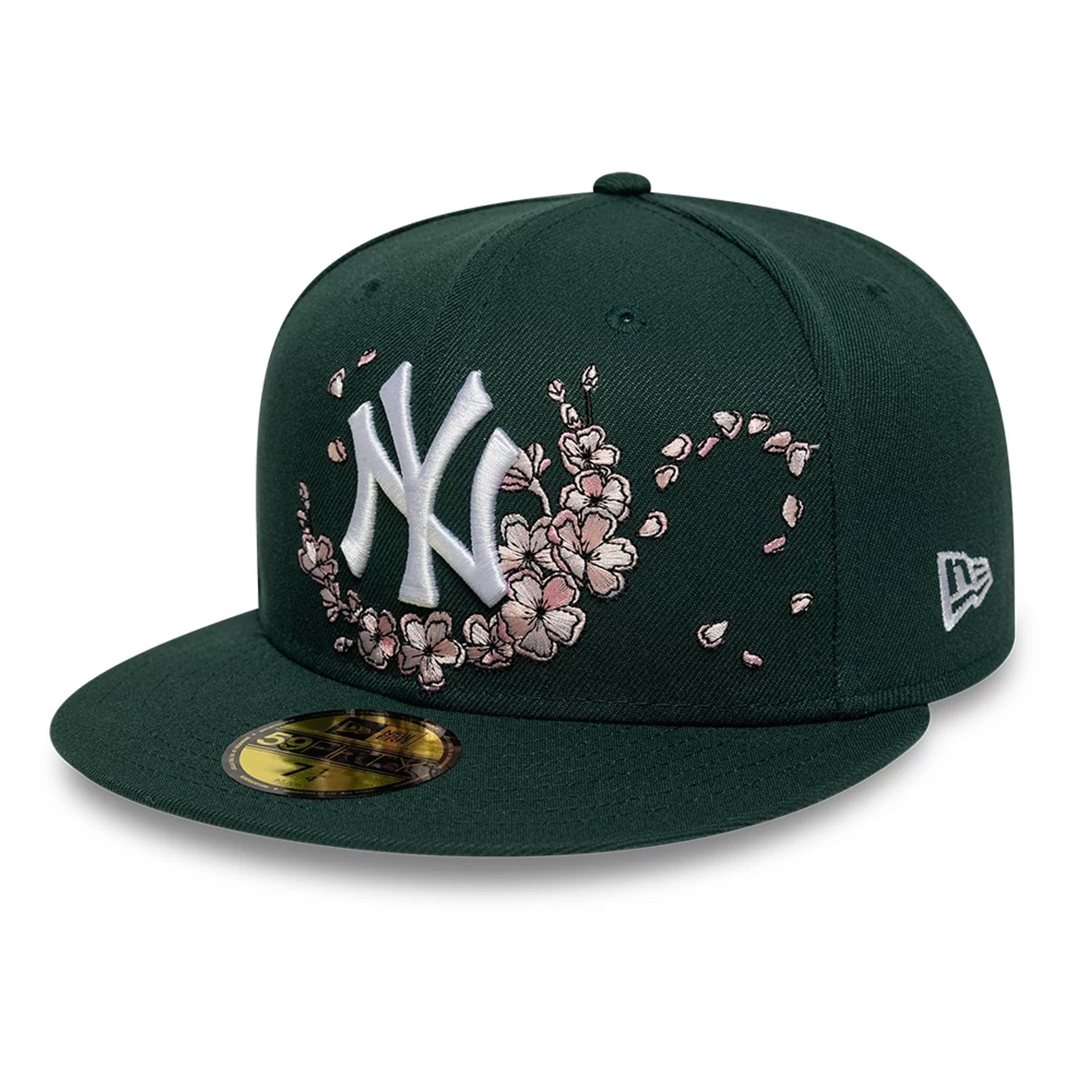 Pictured is this MLB Cherry Blossom New York Yankees 59FIFTY Fitted cap in dark green. 1
