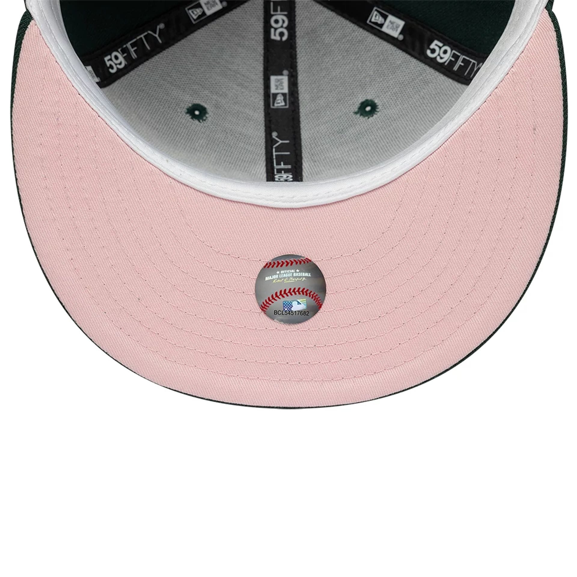 Pictured is this MLB Cherry Blossom New York Yankees 59FIFTY Fitted cap in dark green. 2