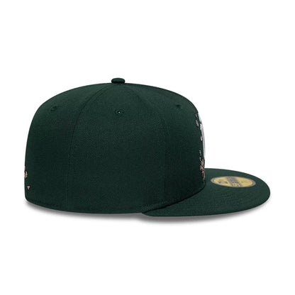 Pictured is this MLB Cherry Blossom New York Yankees 59FIFTY Fitted cap in dark green. 7