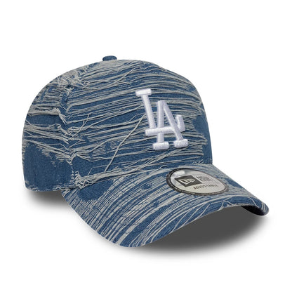 LA Dodgers MLB Distressed Denim Blue New Era 9FORTY E-Frame Adjustable Cap, three-quarter view showing the raised white LA logo embroidered on the front panel, distressed denim pattern across the crown and visor, and 9FORTY size sticker on the visor.