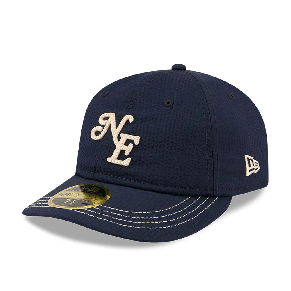 Pictured is this New Era 59FIFTY Day Seersucker Retro Crown 59FIFTY Fitted cap in navy. 3