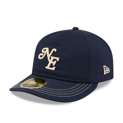 Pictured is this New Era 59FIFTY Day Seersucker Retro Crown 59FIFTY Fitted cap in navy. 3
