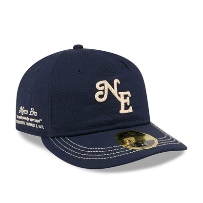 Pictured is this New Era 59FIFTY Day Seersucker Retro Crown 59FIFTY Fitted cap in navy. 1