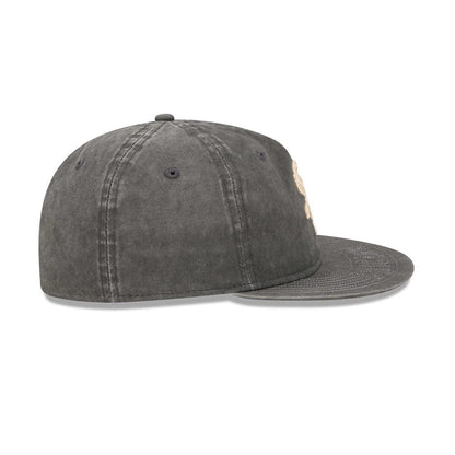 Chicago White Sox MLB 59FIFTY Day Black Retro Crown New Era 59FIFTY Fitted Cap, side view showing the slightly curved flat visor, black embroidered eyelets on the faded black crown, and raised front logo peeking from the side.
