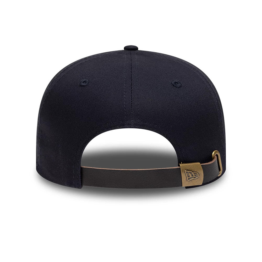 New York Yankees MLB Navy Retro Crown New Era 9FIFTY Adjustable Cap, rear view showing the brown adjustable strap with a brass buckle featuring the New Era logo, and the clean navy structured panels with matching eyelets and top button.
