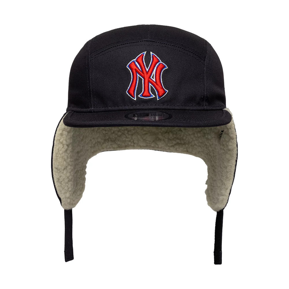 New Era New York Yankees MLB Navy Dogear Camper Adjustable Cap, front view showing a raised red NY logo embroidered on the structured navy crown, with beige fleece-lined ear flaps in an up position and a black visor.