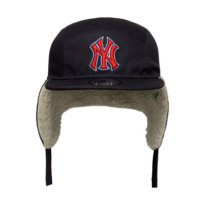 New Era New York Yankees MLB Navy Dogear Camper Adjustable Cap, front view showing a raised red NY logo embroidered on the structured navy crown, with beige fleece-lined ear flaps in an up position and a black visor.