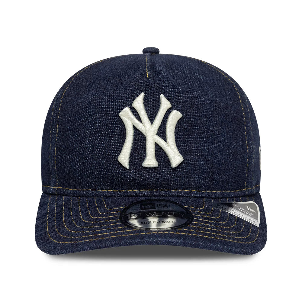 New York Yankees MLB Denim Navy New Era 19TWENTY Adjustable Cap, front view showing the raised white embroidered NY logo on the denim navy crown, a curved visor with yellow stitching, and a 19TWENTY size sticker on the top of the visor.