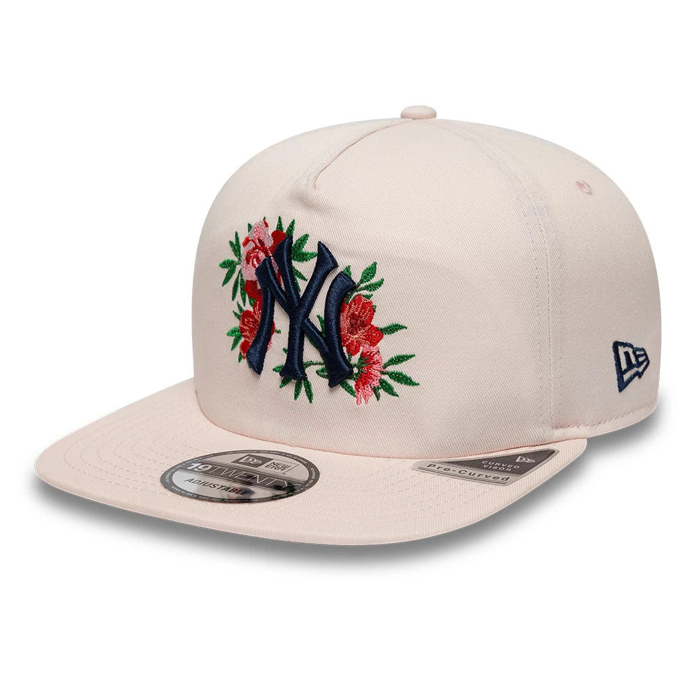 New York Yankees MLB Flower Pastel Pink New Era 19TWENTY Adjustable Cap, three-quarter view showing the navy NY logo with red floral embroidery on the front panel, pastel pink curved visor with a 19TWENTY size sticker.
