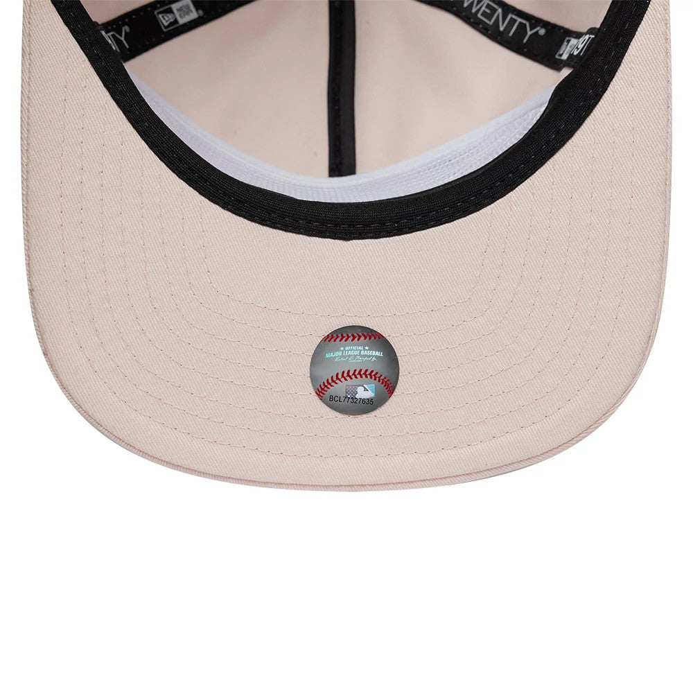 New York Yankees MLB Flower Pastel Pink New Era 19TWENTY Adjustable Cap, inside view showing the black taping along the seams, the white sweatband, and the light pink undervisor with a baseball-themed sticker in the centre.
