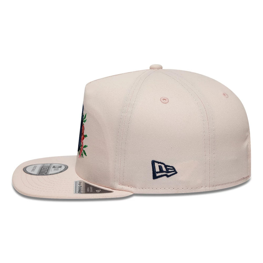 New York Yankees MLB Flower Pastel Pink New Era 19TWENTY Adjustable Cap, side view showing the navy embroidered New Era flag logo on the left side, structured pastel pink crown, and the floral team logo partially on the front panel.