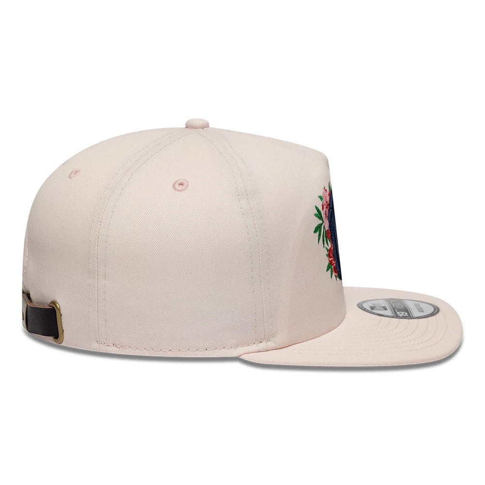 New York Yankees MLB Flower Pastel Pink New Era 19TWENTY Adjustable Cap, side view showing the floral embroidery on the crown, with a structured pastel pink visor and a black buckle strap at the back for adjustable fit.