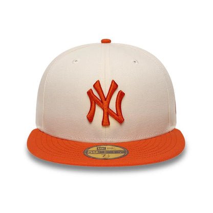 Pictured is this MLB League Essential New York Yankees 59FIFTY Fitted cap in cream. 3