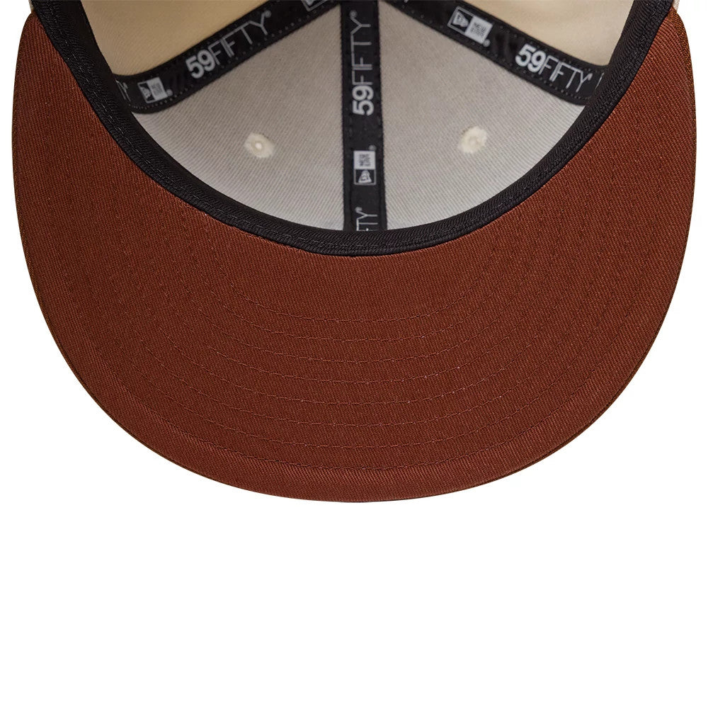 Pictured is this MLB League Essential New York Yankees 59FIFTY Fitted cap in cream. 5