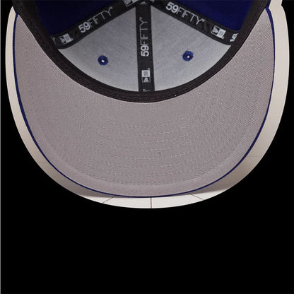 Pictured is this MLB Emblem LA Dodgers 59FIFTY Fitted cap in dark blue. 2