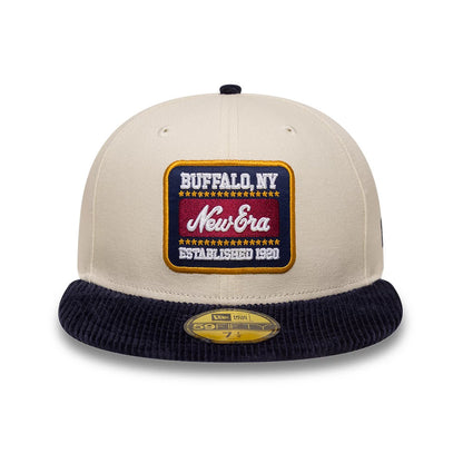 New Era Patch Cord Cream & Black 59FIFTY Fitted Cap, front view showing a rectangular embroidered patch with BUFFALO, NY and New Era text in cream, set above a black corduroy visor with a gold 59FIFTY size sticker.