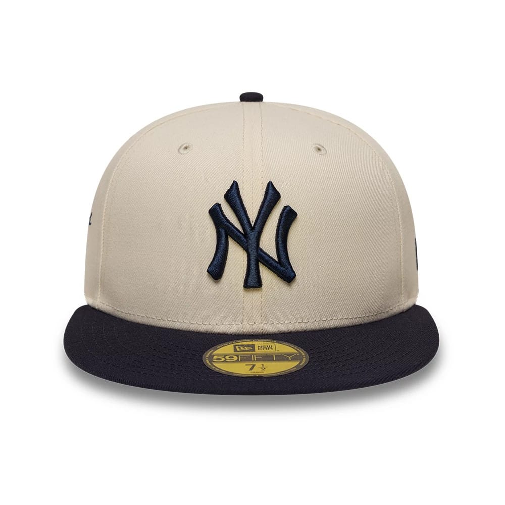 Pictured is this MLB Side Script New York Yankees 59FIFTY Fitted cap in Cream. 2