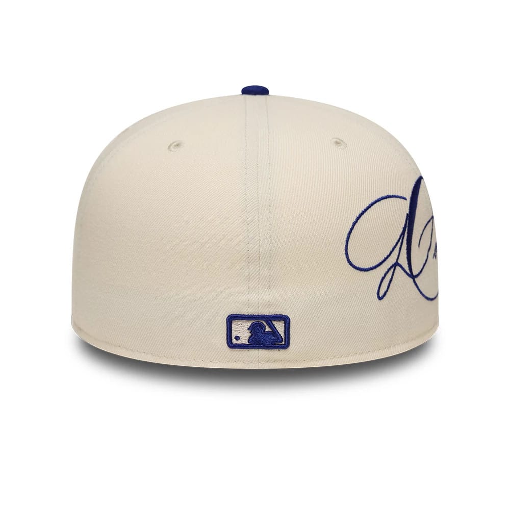 Pictured is this MLB Side Script LA Dodgers 59FIFTY Fitted cap in Cream. 3
