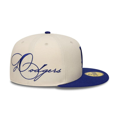 Pictured is this MLB Side Script LA Dodgers 59FIFTY Fitted cap in cream & blue. 6