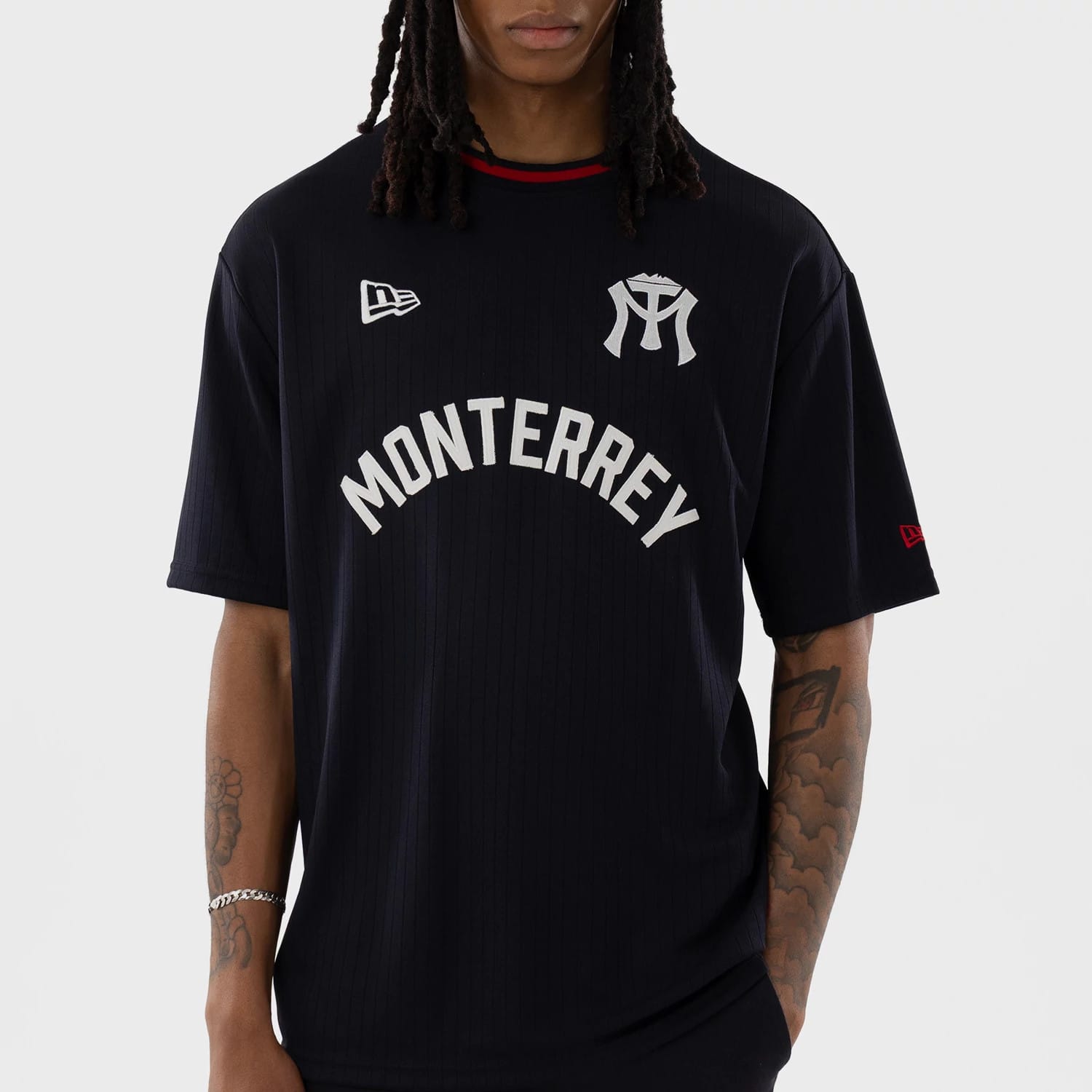 The model is wearing this LMB Sultanes De Monterrey Oversized T-Shirt in navy. 6