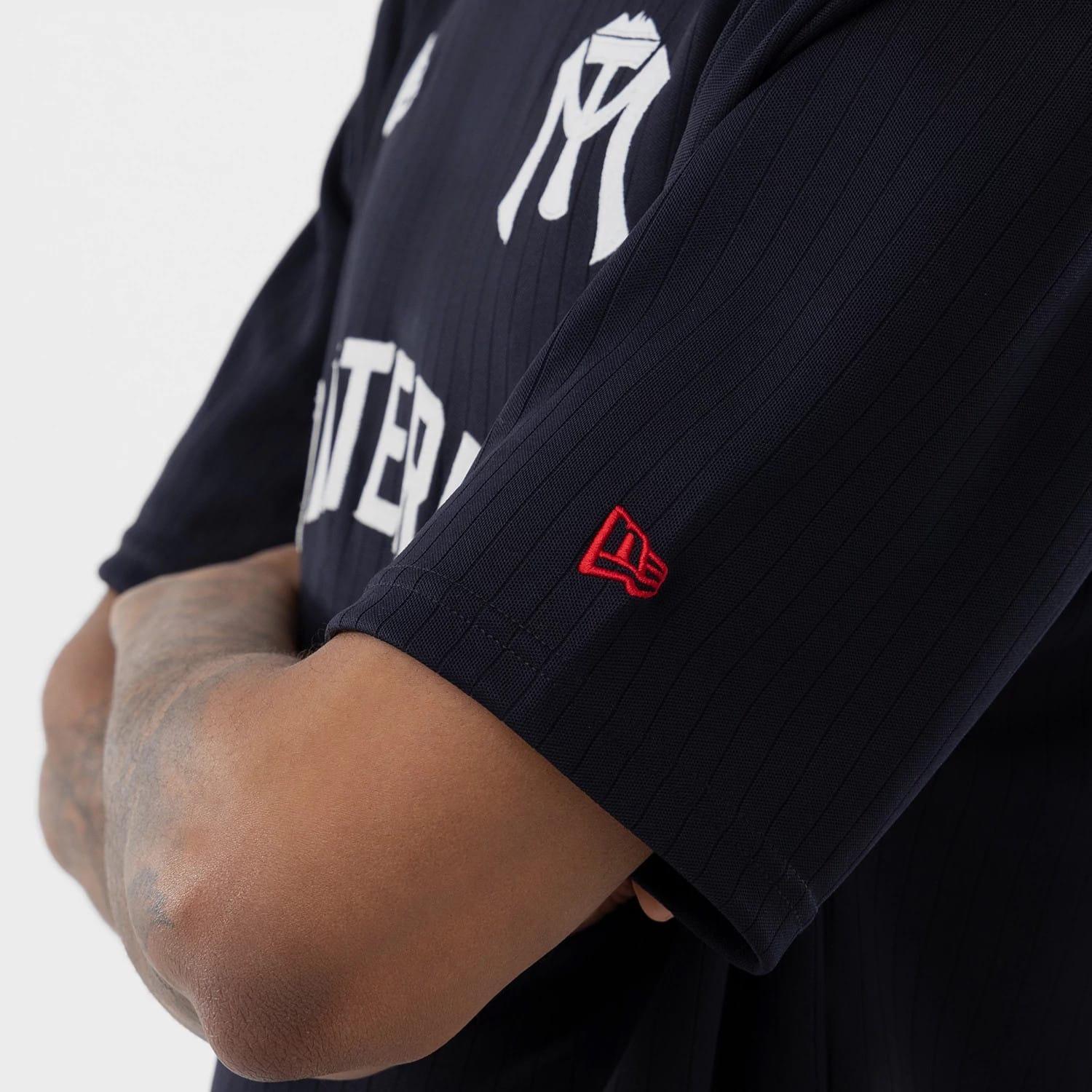 The model is wearing this LMB Sultanes De Monterrey Oversized T-Shirt in navy. 5