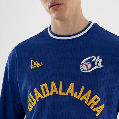 The model is wearing this LMB Charros De Jalisco Oversized T-Shirt in blue. 6