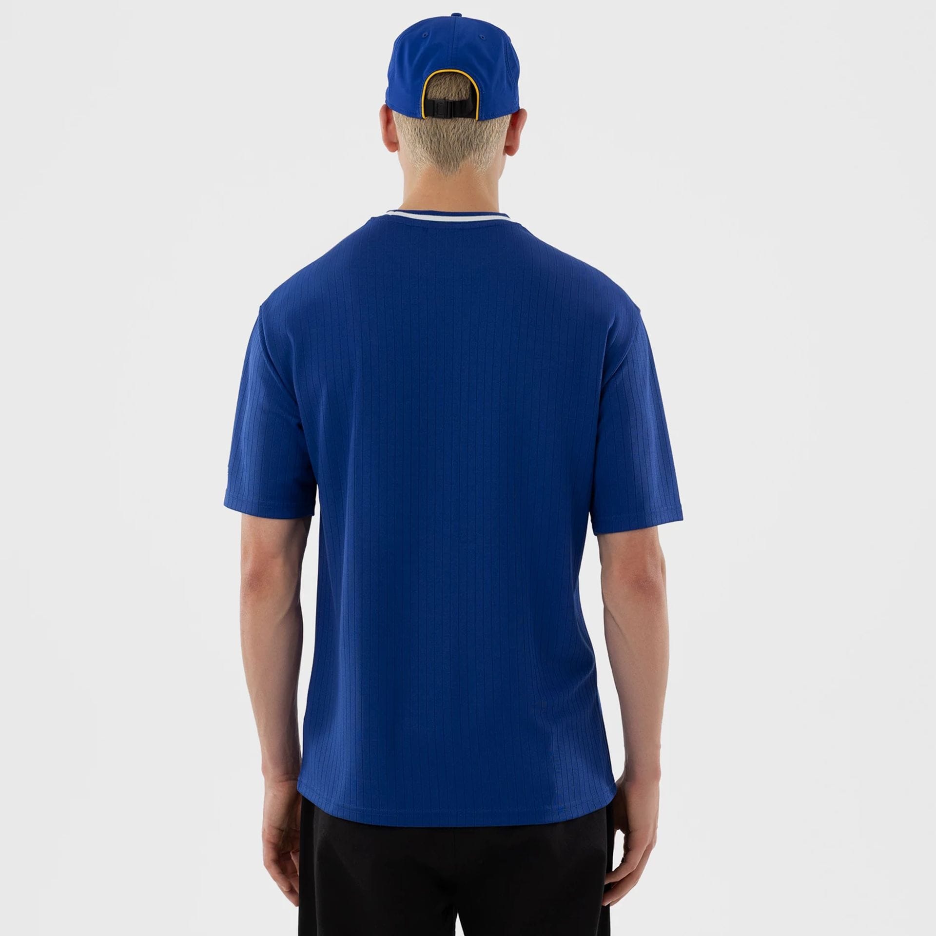 The model is wearing this LMB Charros De Jalisco T-Shirt in blue. 2