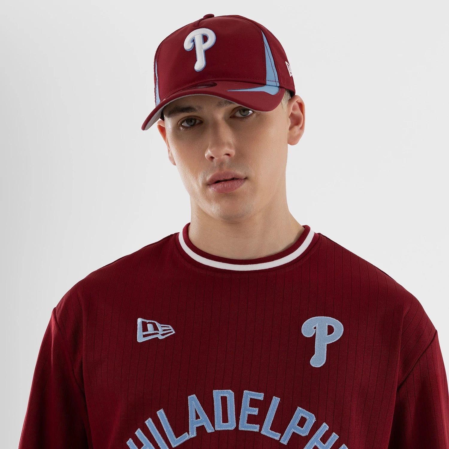 The model is wearing this MLB Philadelphia Phillies Oversized T-Shirt in dark red. 3