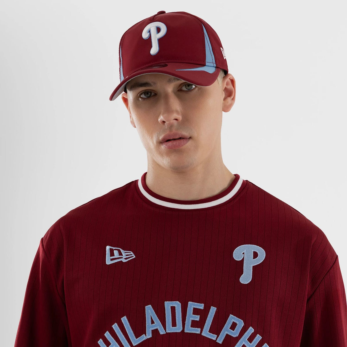 The model is wearing this MLB Philadelphia Phillies Oversized T-Shirt in dark red. 3