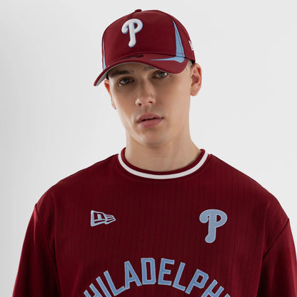 The model is wearing this MLB Philadelphia Phillies Oversized T-Shirt in dark red. 3