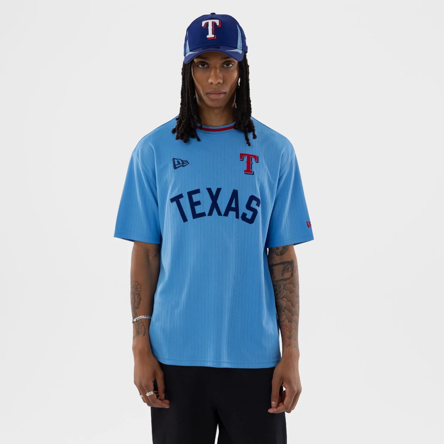 The model is wearing this MLB Texas Rangers Oversized T-Shirt in pastel blue. 1