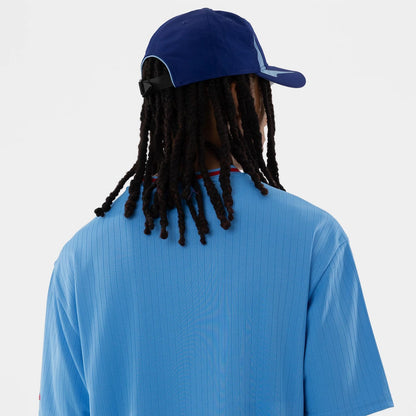 The model is wearing this MLB Texas Rangers Oversized T-Shirt in pastel blue. 6