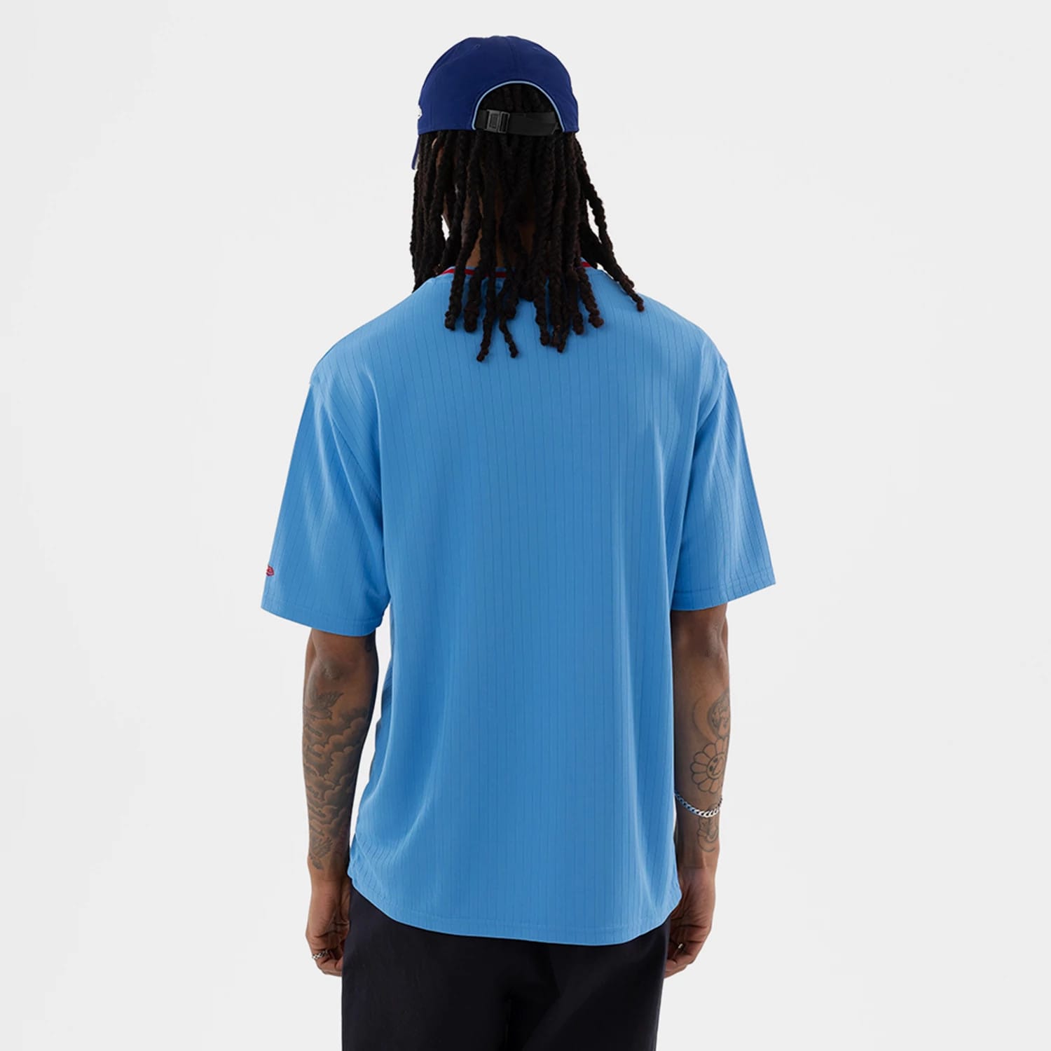 The model is wearing this MLB Texas Rangers Oversized T-Shirt in pastel blue. 2