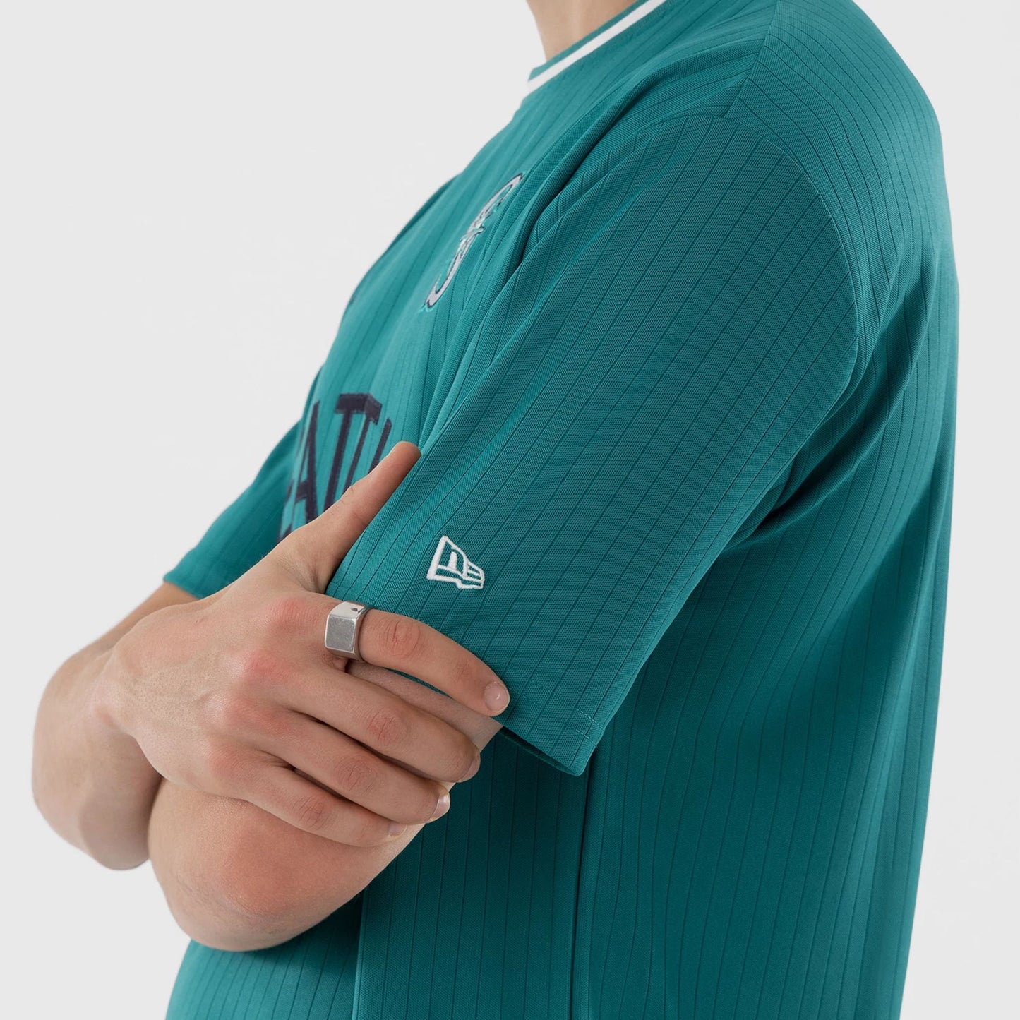 The model is wearing this MLB Seattle Mariners T-Shirt in green. 6