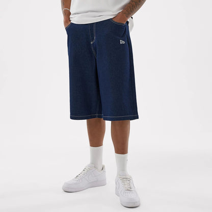 The model is wearing this MLB Jort LA Dodgers Oversized Shorts in dark blue. 1