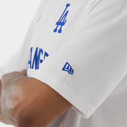 The model is wearing this MLB LA Dodgers T-Shirt in white. 5
