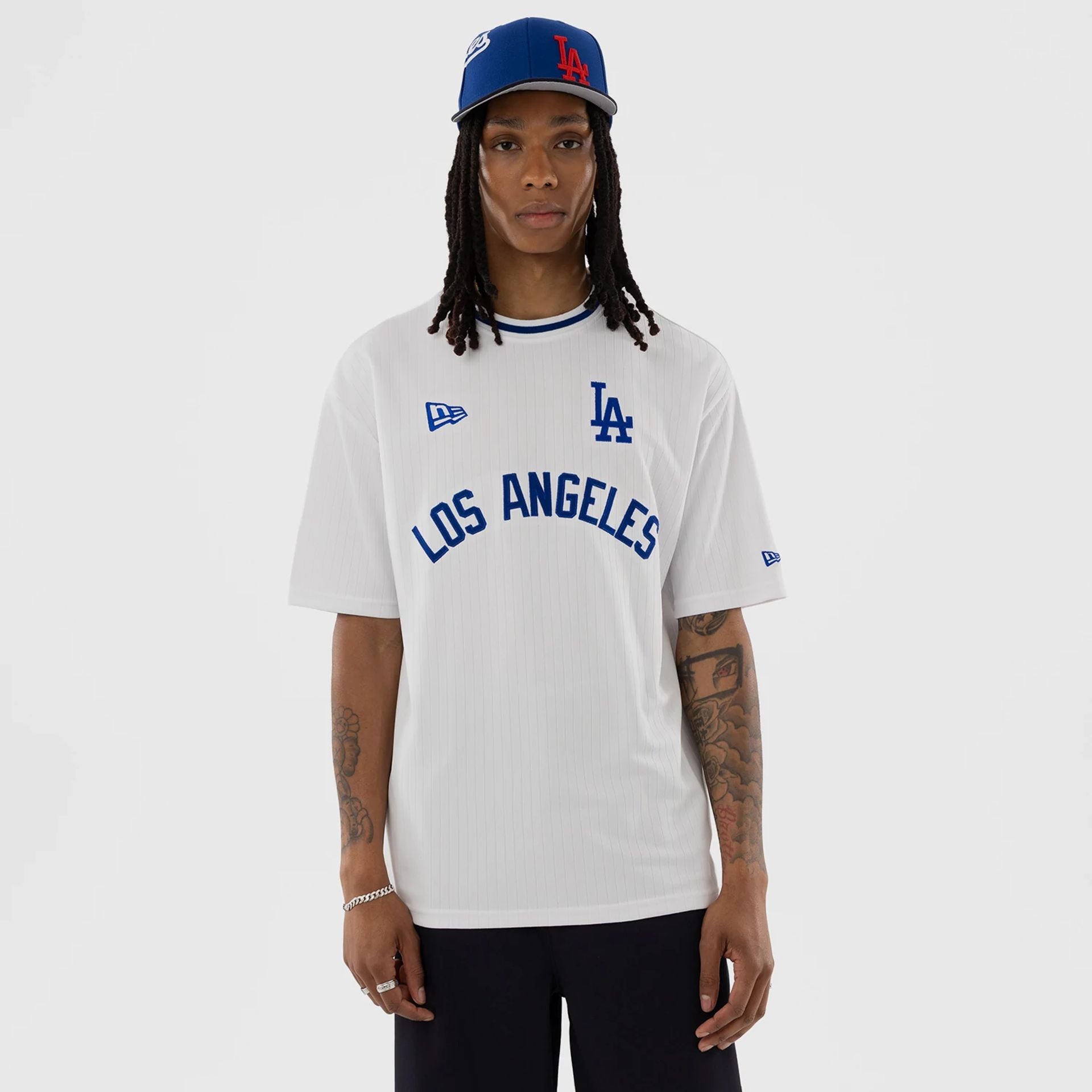 The model is wearing this MLB LA Dodgers T-Shirt in white. 1