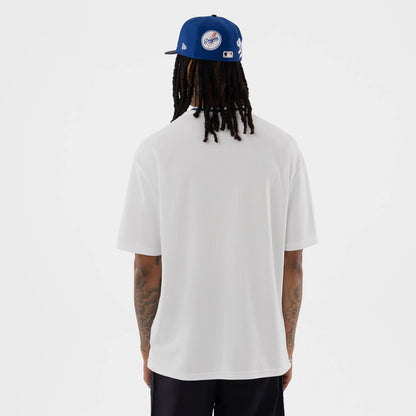 The model is wearing this MLB LA Dodgers T-Shirt in white. 2