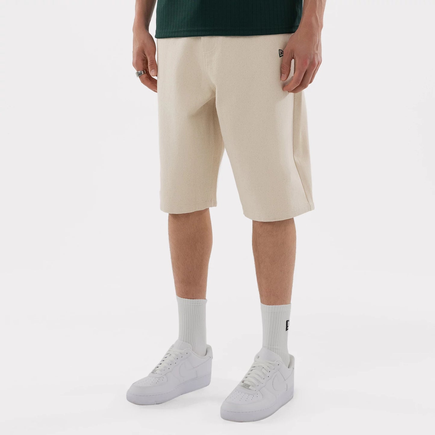 The model is wearing this MLB Jort Athletics Oversized Shorts in Cream. 6