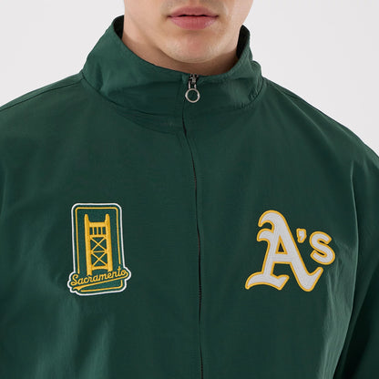 The model is wearing this MLB Athletics Sports Jacket in dark green. 5