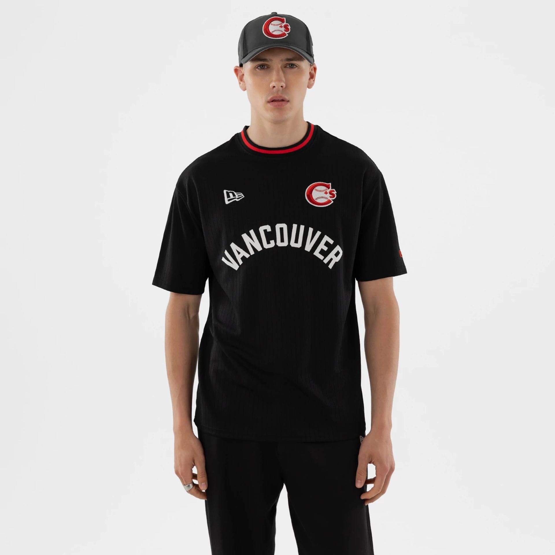 The model is wearing this MiLB Vancouver Canadians T-Shirt in black. 1
