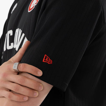 The model is wearing this MiLB Vancouver Canadians Oversized T-Shirt in black. 5